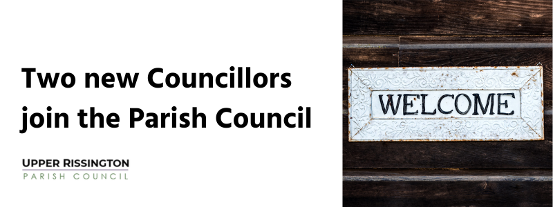 Two new Councillors join the Parish Council featuring a welcome sign